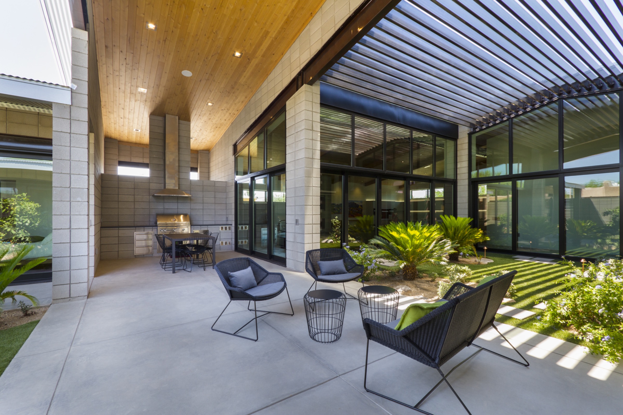 The shaded courtyard of the Barrio Santa Rosa Courtyard House